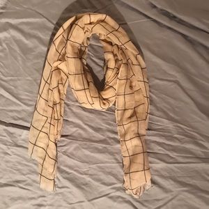 Lightweight cream colored scarf